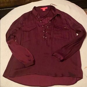 Long sleeve maroon blouse with lace up front.